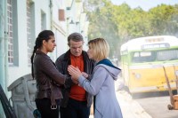 yaz, graham, and jodie outside of bus